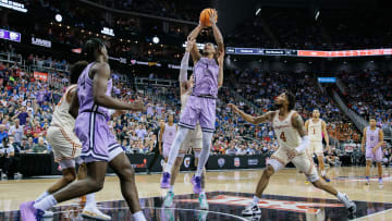 Mar 13, 2024; Kansas City, MO, USA; Kansas State Wildcats forward David N'Guessan (1) shoots the ball during the first half against the Texas Longhorns at T-Mobile Center. Mandatory Credit: William Purnell-USA TODAY Sports