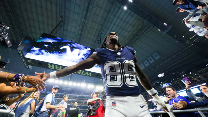 Dec 30, 2023; Arlington, Texas, USA;  Dallas Cowboys wide receiver CeeDee Lamb (88) celebrates with fans after the game against the Detroit Lions at AT&T Stadium. 