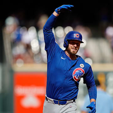 Sep 15, 2024; Denver, Colorado, USA; Chicago Cubs first baseman Michael Busch (29) gestures as he rounds the bases on a solo home run in the seventh inning against the Colorado Rockies at Coors Field. 