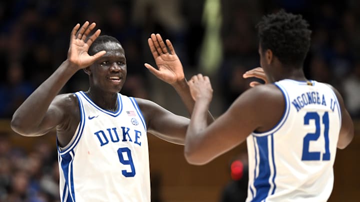 Nov 16, 2024; Durham, North Carolina, USA; Duke basketball center Khaman Maluach (9) welcomes center Patrick Ngongba II (21) to the court in the first half against the Wofford Terriers at Cameron Indoor Stadium. 