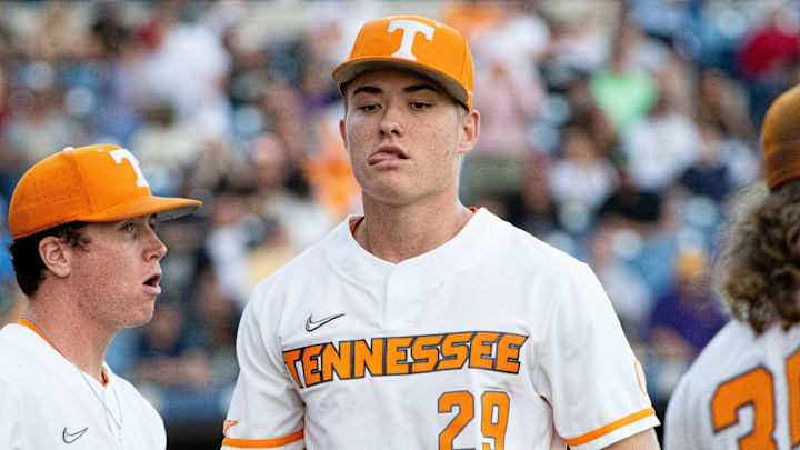 May 26, 2022; Hoover, AL, USA; Tennessee pitcher Blade Tidwell bites his tongue as he leaves the field after completing an inning in the game with Vanderbilt in the SEC Tournament at the Hoover Met in Hoover, Ala., Thursday. Mandatory Credit: Gary Cosby Jr.-The Tuscaloosa News

Sports Sec Baseball Tournament Vanderbilt Vs Tennessee