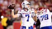 Nov 23, 2024; Fayetteville, Arkansas, USA; Louisiana Tech Bulldogs quarterback Evan Bullock (7) passes during the fourth quarter against the Arkansas Razorbacks at Donald W. Reynolds Razorback Stadium. Arkansas won 35-14. Mandatory Credit: Nelson Chenault-Imagn Images