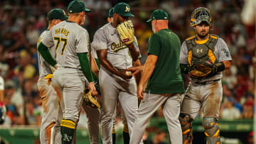 Jul 9, 2024; Boston, Massachusetts, USA; Oakland Athletics manager Mark Kotsay (7) relieves pitcher Michael Otanez (47) in the sixth inning against the Boston Red Sox at Fenway Park. Mandatory Credit: David Butler II-USA TODAY Sports