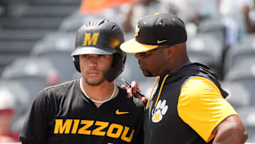 May 20, 2025; Hoover, AL, USA; Missouri hitter Tyler Macon confers with coach Kerrick Jackson during the game with Alabama in the first game of the SEC Baseball Tournament at the Hoover Met.