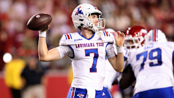 Nov 23, 2024; Fayetteville, Arkansas, USA; Louisiana Tech Bulldogs quarterback Evan Bullock (7) passes during the fourth quarter against the Arkansas Razorbacks at Donald W. Reynolds Razorback Stadium. Arkansas won 35-14. Mandatory Credit: Nelson Chenault-Imagn Images