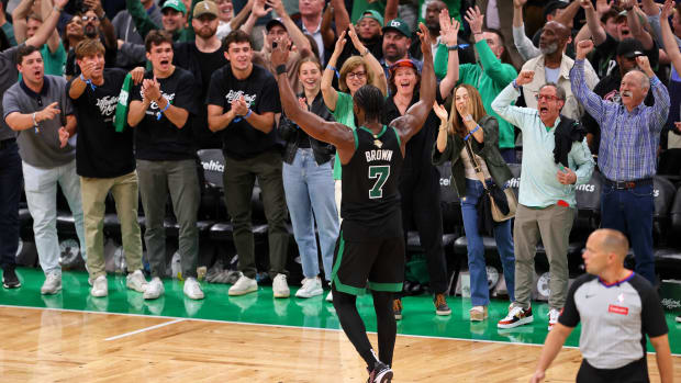 June 9, 2024;  Boston, Massachusetts, USA;  Boston Celtics guard Jaylen Brown (7) reacts after playing against the Dallas Mavericks in the fourth quarter of Game 2 of the 2024 NBA Finals at TD Garden.  Mandatory Credit: Peter Casey – USA TODAY Sports