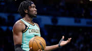 Jan 24, 2025; Charlotte, North Carolina, USA; Charlotte Hornets center Mark Williams (5) reacts after a foul against the Portland Trail Blazers during the third quarter at Spectrum Center. Mandatory Credit: Scott Kinser-Imagn Images