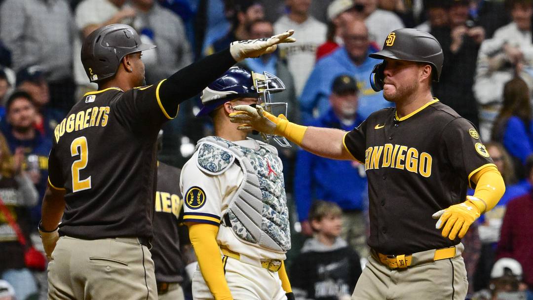 May 13, 2026; Milwaukee, Wisconsin, USA;  San Diego Padres left fielder Gavin Sheets (30) is greeted by San Diego Padres shortstop Xander Bogaerts (2) after hitting a three run home run in the ninth inning against the Milwaukee Brewers at American Family Field. Mandatory Credit: Benny Sieu-Imagn Images