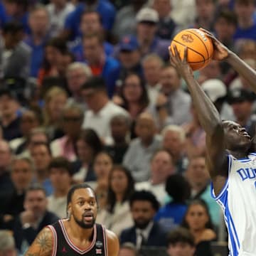 Apr 5, 2025; San Antonio, TX, USA;  Duke Blue Devils center Khaman Maluach (9) dunks against the Houston Cougars in the semifinals of the men's Final Four of the 2025 NCAA Tournament at the Alamodome.