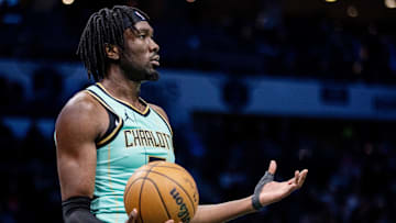 Jan 24, 2025; Charlotte, North Carolina, USA; Charlotte Hornets center Mark Williams (5) reacts after a foul against the Portland Trail Blazers during the third quarter at Spectrum Center. Mandatory Credit: Scott Kinser-Imagn Images