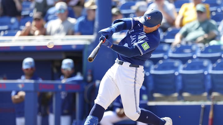 Mar 6, 2026; Dunedin, Florida, USA; Toronto Blue Jays catcher Brandon Valenzuela (59) singles against the Pittsburgh Pirates in the fourth inning during spring training at TD Ballpark. Mandatory Credit: Nathan Ray Seebeck-Imagn Images