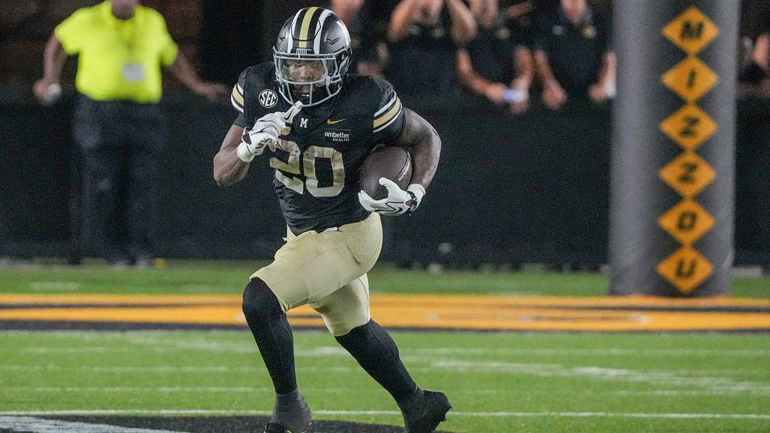 Sep 19, 2026; Columbia, Missouri, USA; Missouri Tigers running back Jamal Roberts (20) runs the ball against the Troy Trojans during the second half of the game at Faurot Field at Memorial Stadium. Mandatory Credit: Denny Medley-Imagn Images Sep 19, 2026; Columbia, Missouri, USA; Missouri Tigers running back Jamal Roberts (20) runs the ball against the Troy Trojans during the second half of the game at Faurot Field at Memorial Stadium. Mandatory Credit: Denny Medley-Imagn Images