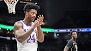 Mar 12, 2025; Kansas City, MO, USA; Kansas Jayhawks forward KJ Adams Jr. (24) reacts after a play during the first half against the UCF Knights at T-Mobile Center. Mandatory Credit: William Purnell-Imagn Images
