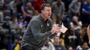 Vanderbilt Commodores head coach Mark Byington cheers on his team against the Texas Longhorns during the second half at Bridgestone Arena.