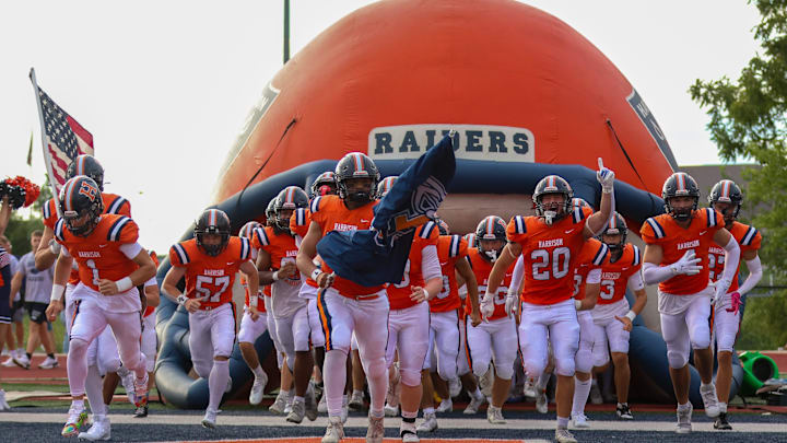 The Harrison Raiders take the field Friday, August 22, 2025, before the IHSAA football game against the West Lafayette Red Devils at Harrison High School in West Lafayette, Indiana.