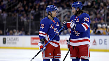Mar 2, 2025; New York, New York, USA; New York Rangers left wing Artemi Panarin (10) and New York Rangers center Mika Zibanejad (93) talk to one another during the second period against the Nashville Predators at Madison Square Garden. Mandatory Credit: Brad Penner-Imagn Images
