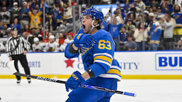 Oct 15, 2025; St. Louis, Missouri, USA; St. Louis Blues left wing Jake Neighbours (63) reacts after scoring against the Chicago Blackhawks during the first period at Enterprise Center. Mandatory Credit: Jeff Curry-Imagn Images