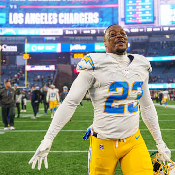 Dec 28, 2024; Foxborough, Massachusetts, USA; Los Angeles Chargers safety Tony Jefferson (23) celebrates after defeating the New England Patriots at Gillette Stadium. Mandatory Credit: David Butler II-Imagn Images