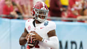 Alabama Crimson Tide quarterback Jalen Milroe looks to throw before a game against the Michigan Wolverines.