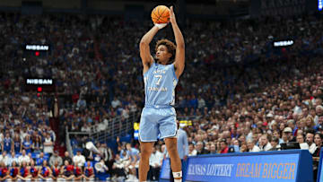 Nov 8, 2024; Lawrence, Kansas, USA; North Carolina Tar Heels guard Seth Trimble (7) shoots the ball during the first half against the Kansas Jayhawks at Allen Fieldhouse. Mandatory Credit: Jay Biggerstaff-Imagn Images