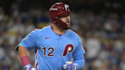Oct 8, 2025; Los Angeles, California, USA; Philadelphia Phillies designated hitter Kyle Schwarber (12) rounds the bases hitting a solo home run off Los Angeles Dodgers pitcher Yoshinobu Yamamoto (18) during the fourth inning of game three of the NLDS during the 2025 MLB playoffs at Dodger Stadium. Mandatory Credit: Jayne Kamin-Oncea-Imagn Images