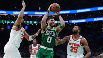 May 7, 2025; Boston, Massachusetts, USA; New York Knicks forward Mikal Bridges (25) and center Karl-Anthony Towns (32) defend against Boston Celtics forward Jayson Tatum (0) in the second half during game two of the second round for the 2025 NBA Playoffs at TD Garden. Mandatory Credit: David Butler II-Imagn Images