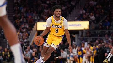 Oct 18, 2024; San Francisco, California, USA; Los Angeles Lakers guard Bronny James (9) dribbles the ball against the Golden State Warriors in the second quarter at the Chase Center. Mandatory Credit: Cary Edmondson-Imagn Images
