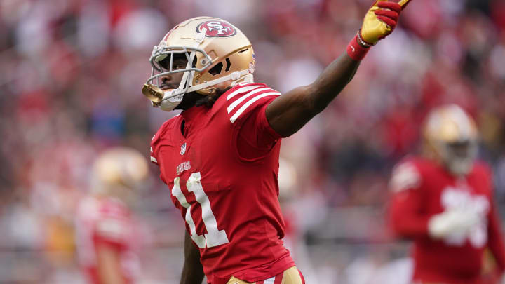 Dec 11, 2022; Santa Clara, California, USA; San Francisco 49ers wide receiver Brandon Aiyuk (11) celebrates after catching a touchdown pass against the Tampa Bay Buccaneers in the second quarter at Levi's Stadium. Mandatory Credit: Cary Edmondson-USA TODAY Sports