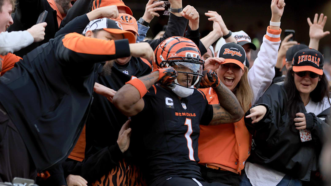 Dec 28, 2025; Cincinnati, Ohio, USA; Cincinnati Bengals wide receiver Ja'Marr Chase (1) celebrates after a touchdown against the Arizona Cardinals during the first half at Paycor Stadium. Mandatory Credit: Katie Stratman-Imagn Images