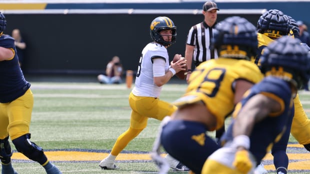 West Virginia University redshirt sophomore quarterback Nicco Marchiol looks downfield during the 2024 Gold-Blue Spring Game.