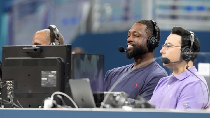 Jul 27, 2024; Villeneuve-d'Ascq, France; Dwyane Wade looks on from the media bench during the first half between Canada and Greece during the Paris 2024 Olympic Summer Games at Stade Pierre-Mauroy. Mandatory Credit: John David Mercer-USA TODAY Sports