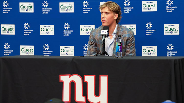 Apr 25, 2025; East Rutherford, NJ, US;  New York Giants first round draft pick, Jaxson Dart, takes questions from the media during his introduction press conference. New York Giants Mandatory Credit: Thomas Salus-Imagn Images