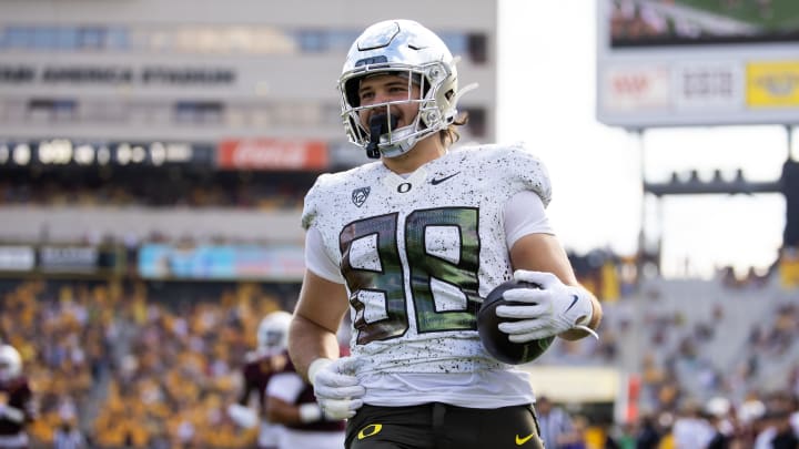 Nov 18, 2023; Tempe, Arizona, USA; Oregon Ducks tight end Patrick Herbert (88) scores a touchdown against the Arizona State Sun Devils at Mountain America Stadium.