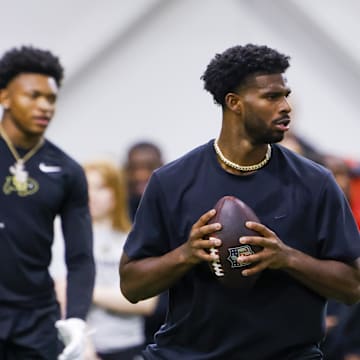 Sanders passes the ball at Colorado Pro Day. 