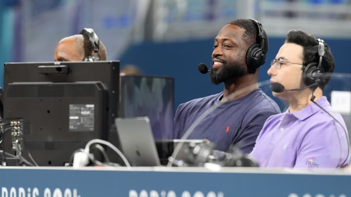 Jul 27, 2024: Dwyane Wade looks on from the media bench during the first half between Canada and Greece during the Paris 2024 Olympic Summer Games.