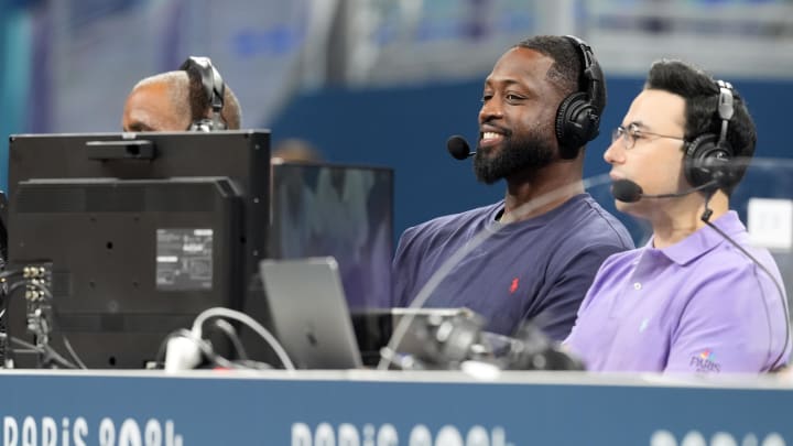 Jul 27, 2024; Villeneuve-d'Ascq, France; Dwyane Wade looks on from the media bench during the first half between Canada and Greece during the Paris 2024 Olympic Summer Games at Stade Pierre-Mauroy. Mandatory Credit: John David Mercer-USA TODAY Sports