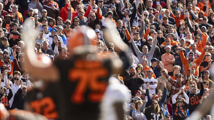 Oct 9, 2022; Cleveland, Ohio, USA; Cleveland Browns fans celebrate a touchdown against the Los Angeles Chargers during the third quarter at FirstEnergy Stadium. Mandatory Credit: Scott Galvin-USA TODAY Sports