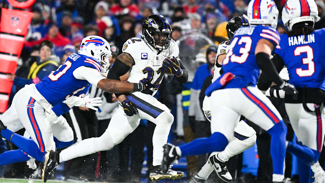 Baltimore Ravens running back Derrick Henry runs the ball against the Buffalo Bills in a 2025 AFC divisional round game