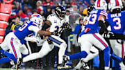 Baltimore Ravens running back Derrick Henry runs the ball against the Buffalo Bills in a 2025 AFC divisional round game