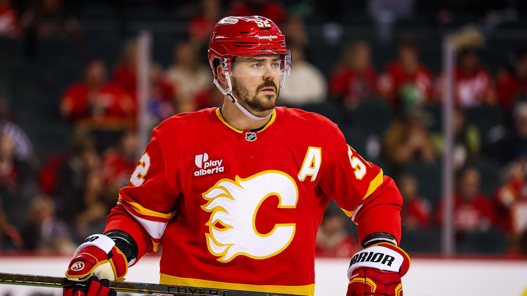 Jan 23, 2026; Calgary, Alberta, CAN; Calgary Flames defenseman MacKenzie Weegar (52) against the Washington Capitals during the third period at Scotiabank Saddledome. Mandatory Credit: Sergei Belski-Imagn Images
