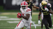 Sep 28, 2024; Winston-Salem, North Carolina, USA;  Louisiana-Lafayette Ragin Cajuns wide receiver Lance LeGendre (9) runs for yards after catch against the Wake Forest Demon Deacons during the second half at Allegacy Federal Credit Union Stadium. Mandatory Credit: Jim Dedmon-Imagn Images