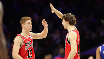 Feb 24, 2025; Philadelphia, Pennsylvania, USA; Chicago Bulls guard Kevin Huerter (13) high fives forward Matas Buzelis (14) after scoring against the Philadelphia 76ersduring the third quarter at Wells Fargo Center. Mandatory Credit: Bill Streicher-Imagn Images