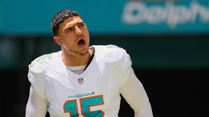 Sep 8, 2024; Miami Gardens, Florida, USA; Miami Dolphins linebacker Jaelan Phillips (15) runs onto the field before the game against the Jacksonville Jaguars at Hard Rock Stadium. Mandatory Credit: Sam Navarro-Imagn Images