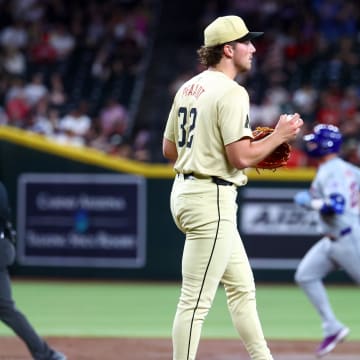 Aug 27, 2024; Phoenix, Arizona, USA; Arizona Diamondbacks pitcher Brandon Pfaadt reacts after giving up a home run to New York Mets first baseman Pete Alonso in the second inning at Chase Field. Mandatory Credit: Mark J. Rebilas-USA TODAY Sports