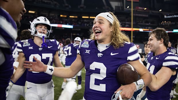 Avery Johnson celebrates Kansas State's Rate Bowl win over Rutgers.