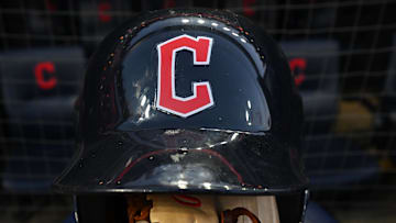 Oct 15, 2022; Cleveland, Ohio, USA; A Cleveland Guardians helmet and glove before game three of the NLDS for the 2022 MLB Playoffs at Progressive Field. Mandatory Credit: Ken Blaze-Imagn Images