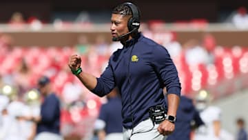 Sep 27, 2025; Fayetteville, Arkansas, USA; Notre Dame Fighting Irish head coach Marcus Freeman celebrates after a score during the third quarter against the Arkansas Razorbacks at Donald W. Reynolds Razorback Stadium. Notre Dame won 56-13. Mandatory Credit: Nelson Chenault-Imagn Images