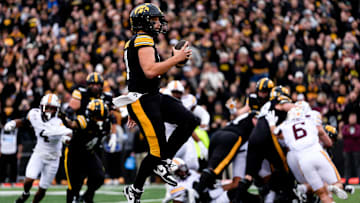 Iowa Hawkeyes quarterback Mark Gronowski has passed for just 946 yards and four touchdowns with four interceptions, but he's a running threat with 313 yards and 11 TDs, most among Big Ten QBs.