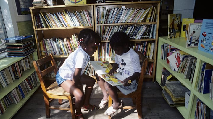 Young Students Reading in One-Room Schoolhouse Young Students Reading in One-Room Schoolhouse