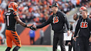 Oct 26, 2025; Cincinnati, Ohio, USA; Cincinnati Bengals wide receiver Ja'Marr Chase (1) shakes hands with head coach Zac Taylor during the fourth quarter against the New York Jets  at Paycor Stadium. Mandatory Credit: Joseph Maiorana-Imagn Images